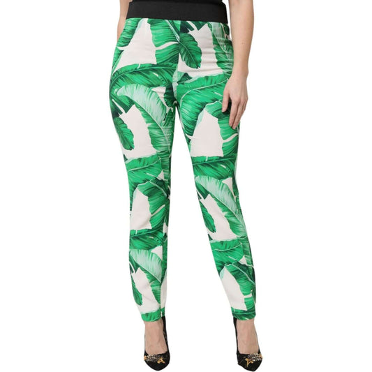 Dolce & Gabbana white green leaf high waist pants with zipper closure, 100% viscose, made in Italy, featuring exclusive craftsmanship.