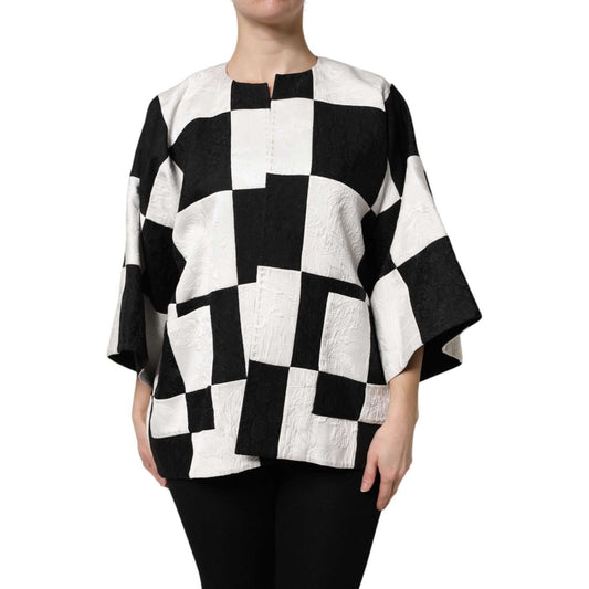 Dolce & Gabbana white and black patchwork jacquard blazer with oversized fit and soft brocade design, modeled on a person