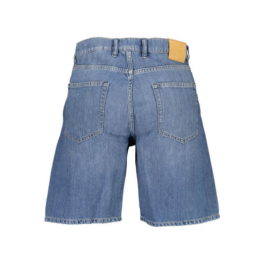 Back view of Gant blue cotton men's Bermuda jeans with chic faded effect, showcasing iconic logo and superior craftsmanship.