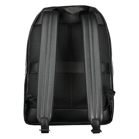 Back view of Tommy Hilfiger black polyester backpack with adjustable shoulder straps and mesh padding for comfort.