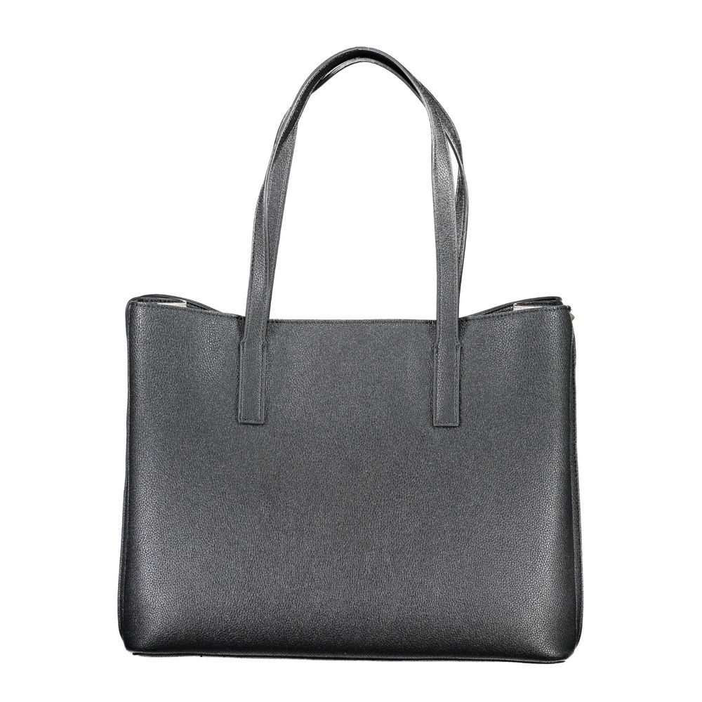 Front view with bag zipped and handles upright.