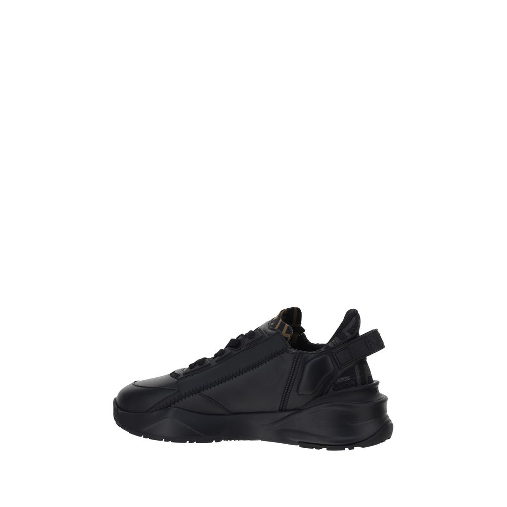Side view of black Fendi Flow Running Sneakers with structured sole and press-engraved logo.