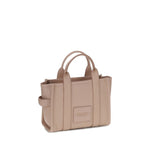 Marc Jacobs The Small Tote Handbag in beige leather with top handles and removable shoulder strap.