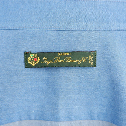 Label on Made in Italy Blue Cotton Men's Shirt by Loro Piana displaying craftsmanship and premium fabric details.
