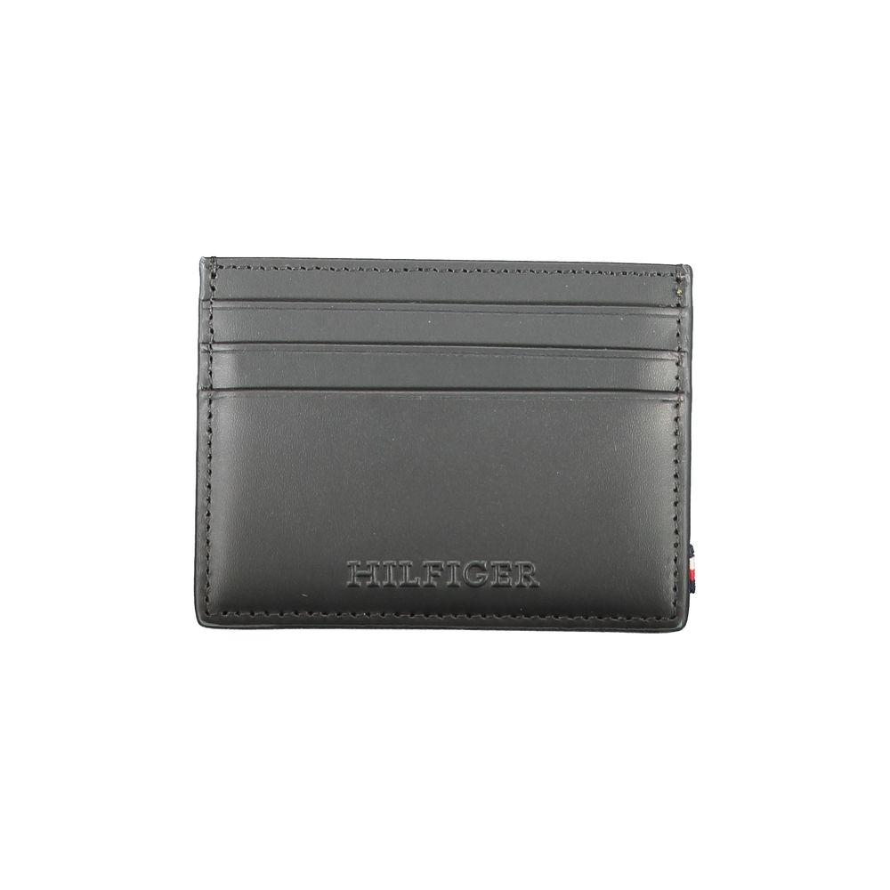 Tommy Hilfiger Black Leather Wallet with card holder, central pocket, card spaces, contrast details, and logo.