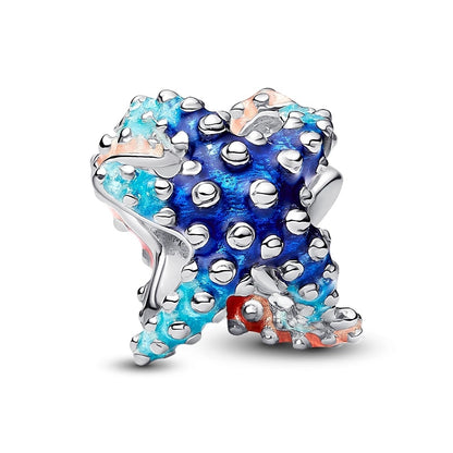 PANDORA Mod. 793817C01 blue starfish-inspired charm with silver accents.