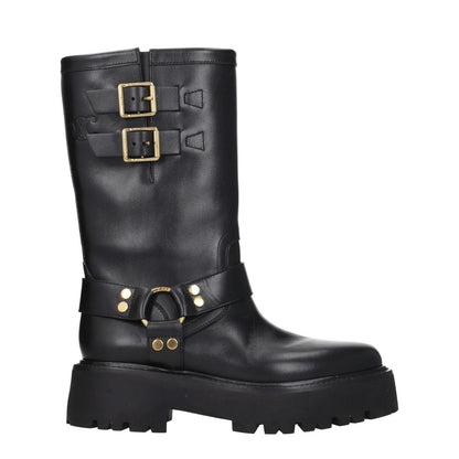 Black leather ankle boots with gold buckle and strap details. Round toe, lug sole, mid-calf height. Ideal for edgy casual wear.
