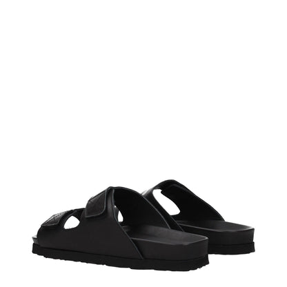 Palm Angels Black Leather Slippers with strap closure and logo, open toe, low flat heel, rubber sole, designed for casual style.