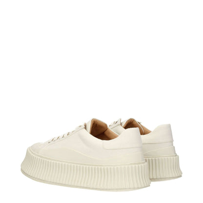 Jil Sander White Fabric Platform Sneakers with round toe and 5 cm wedge heel, featuring an aged effect and lace-up closure.