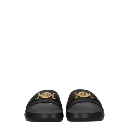 Versace Black Leather Slippers with gold front detail, casual style, open toe, black leather with rubber sole, perfect for stylish comfort.