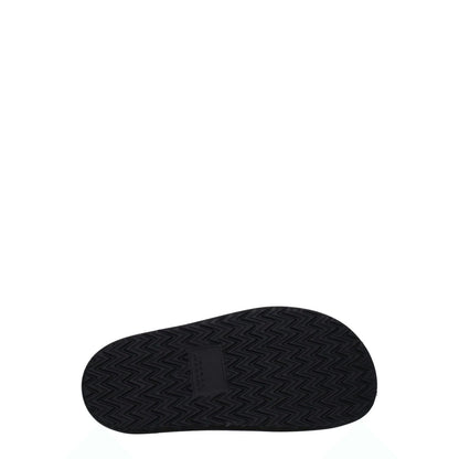Sole view of Isabel Marant Black Leather Slippers with rubber pattern and vintage design features.