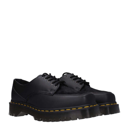 Dr. Martens Black Leather Oxfords And Derbies with lace up design and rubber sole, featuring a casual style and square toe.
