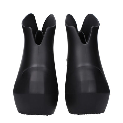 Rear view of Givenchy Black Cotton Wedge Sandals with rubber sole and wedge heel, showcasing modern design and casual style.