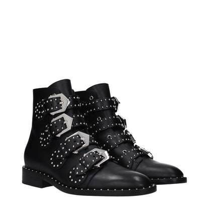 Givenchy Black Leather Ankle Boots with studs and buckle closure, featuring low, flat heel and round toe. MPN: BE08143004001