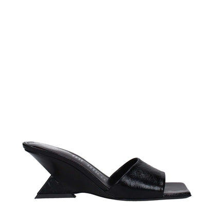 The Attico Black Leather Flat Sandals with vintage and aged effect, side view. MPN S605L070100, code F83208.