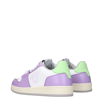 Versace White Leather Low Top Sneakers with lilac accents, featuring logo design on back and side, lace-up closure, and rubber sole.