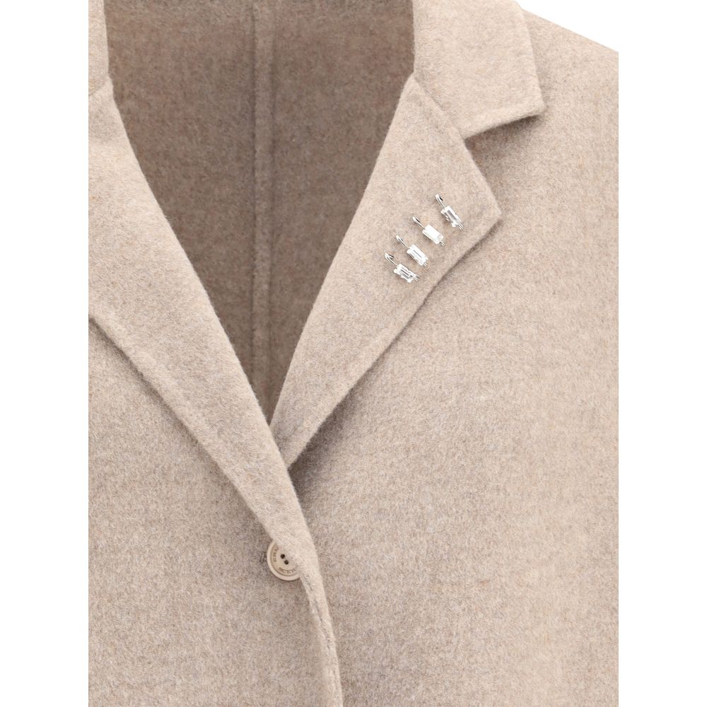Close-up of Ermanno Scervino Beige Wool Coat showing lapel with rhinestone pins and button closure.