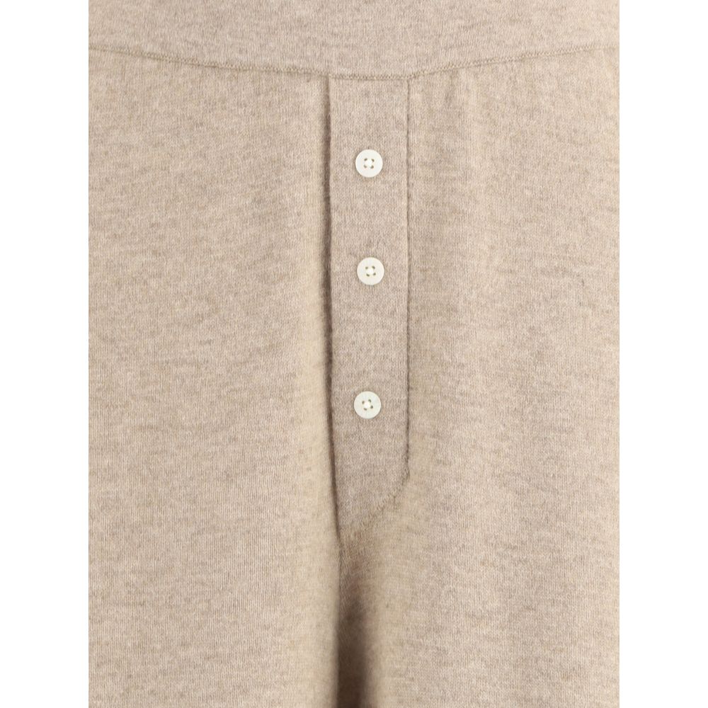 Front detail of Guest in Residence Beige Cashmere Casual Pants with buttons, showcasing luxury and style.