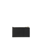 Saint Laurent Card Holder in black calfskin with YSL logo, zipper closure, and back card slot, luxury accessory made in Italy for AW25.