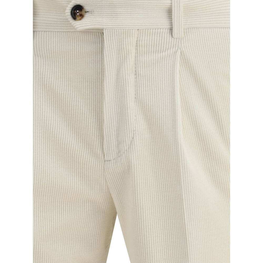 Close-up of Brunello Cucinelli Cream Cotton Two-Piece Suit trousers with zip and button closure, showing fine corduroy texture.