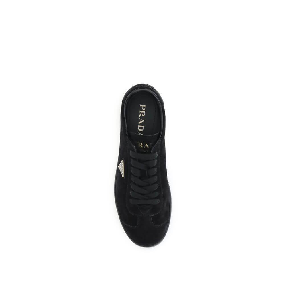 Top view of Prada Black Calf Leather Bos Taurus Low Top Sneakers with iconic triangular plaque and tone-on-tone logo.