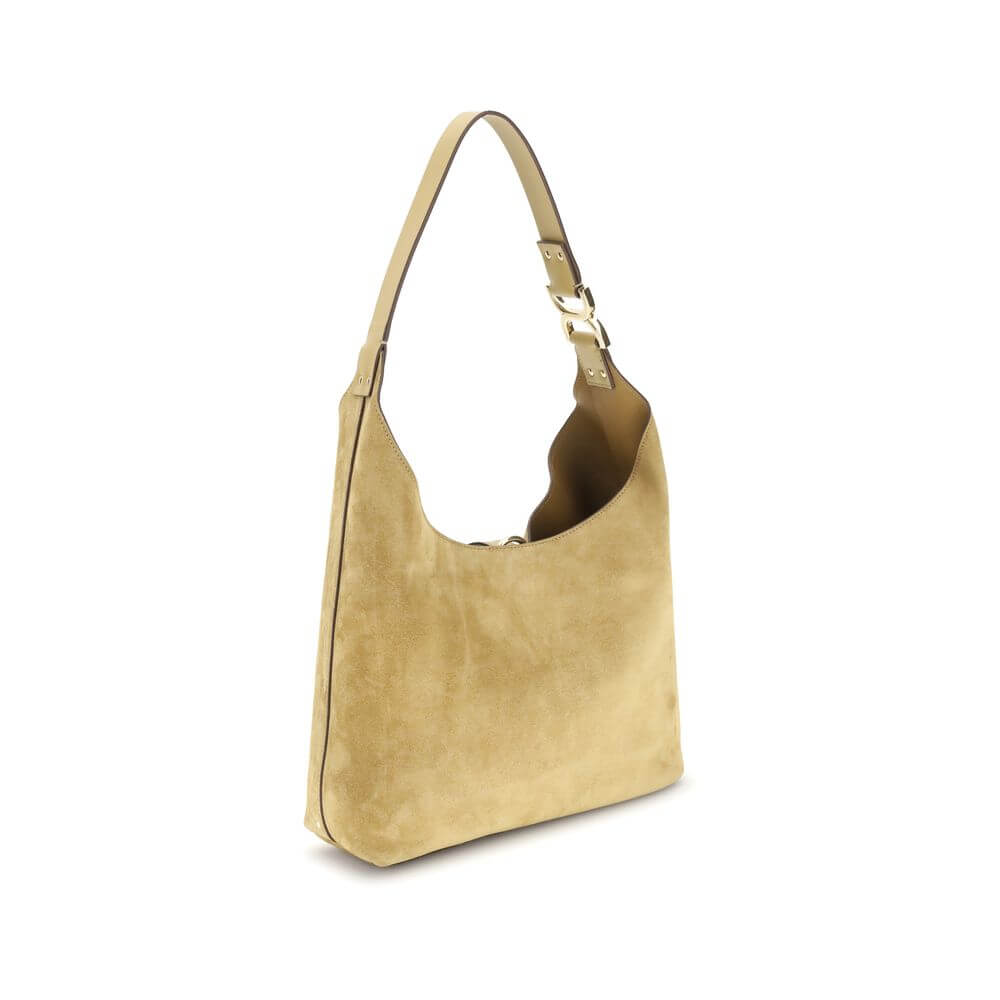 Chloé Beige Calf Leather Bos Taurus Shoulder Bag with suede finish and tasseled closure, iconic golden metallic element on handle.