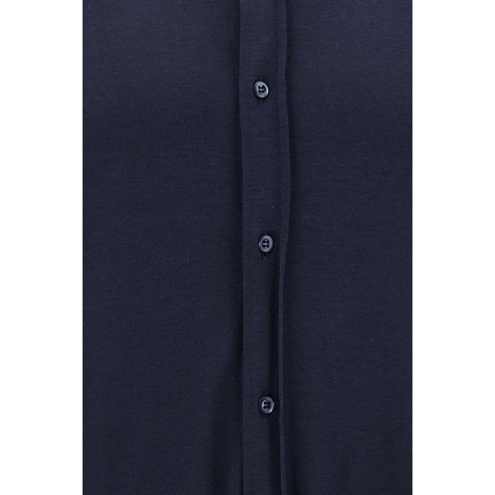 Close-up of Brunello Cucinelli Blue Silk Shirt showcasing button details and luxurious fabric.