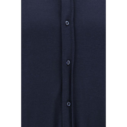 Close-up of Brunello Cucinelli Blue Silk Shirt showcasing button details and luxurious fabric.