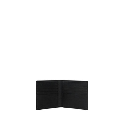 Saint Laurent Black Calf Leather Bos Taurus Wallet with card slots and billfold design, grained leather, iconic signature, AW25 collection.