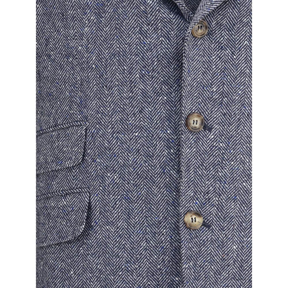 Close-up of Brunello Cucinelli Blue Wool Blazer with herringbone pattern and button details.