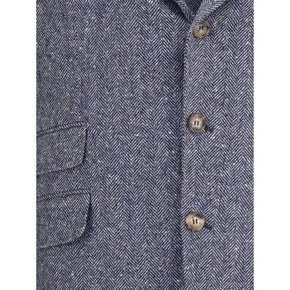 Close-up of Brunello Cucinelli Blue Wool Blazer with herringbone pattern and button details.