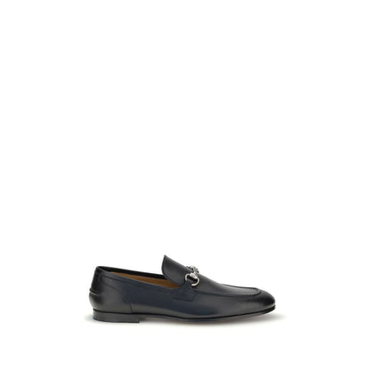 Gucci Black Calf Leather Bos Taurus Slip-On Loafers with metallic Morsetto detail and elegant silhouette.