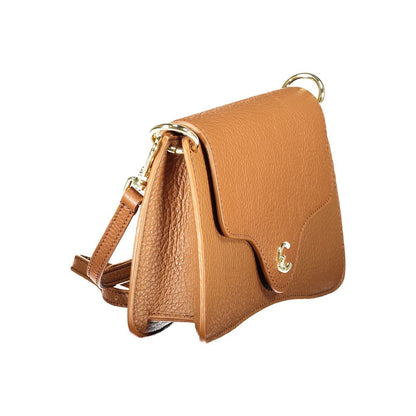 Coccinelle Brown Leather Women Handbag with adjustable strap and snap closure, showcasing elegance and modern style.