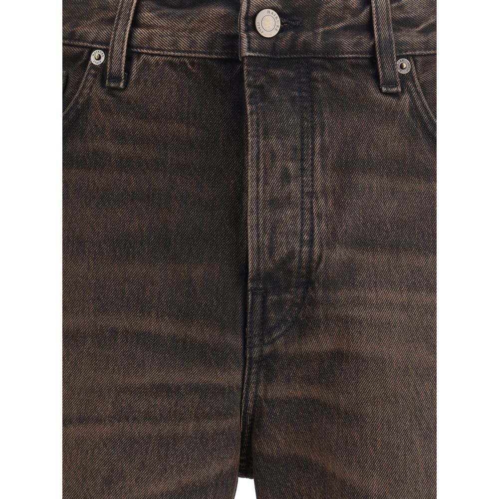 Haikure Brown Cotton Relaxed Fit Jeans with button closure and adjustable side straps, featuring a classic five-pocket design for AW25 season.