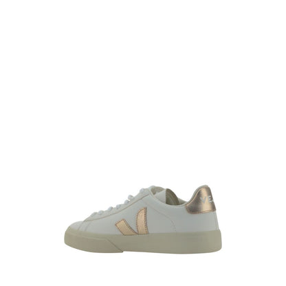 Veja White Calf Leather Bos Taurus Low Top Sneakers with round toe and contrast panels, side logo, lace-up front, and rubber sole.