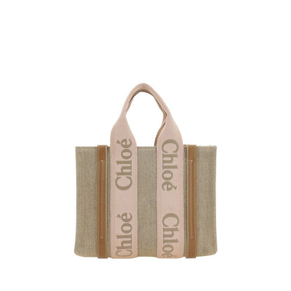 Chloé Beige Linen Handbag with leather accents, featuring double flat handles and adjustable shoulder strap for versatile use.