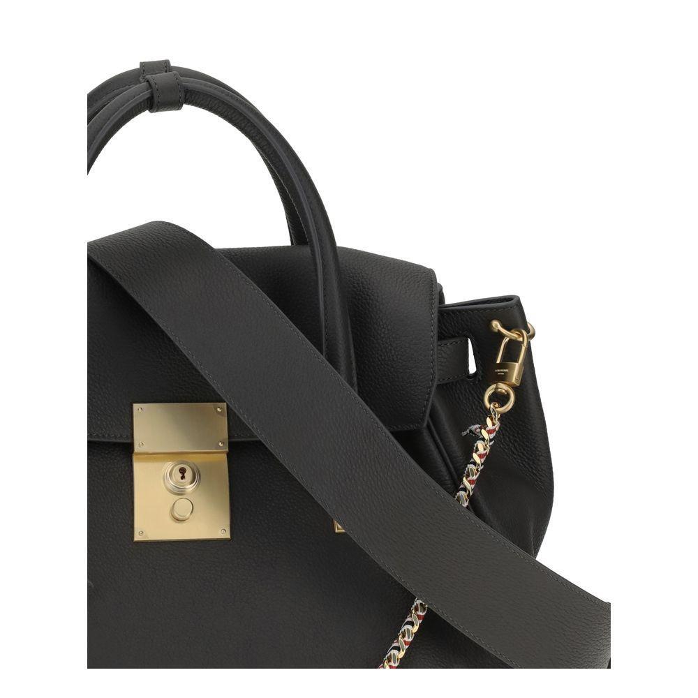 Front view with bag zipped and handles upright.