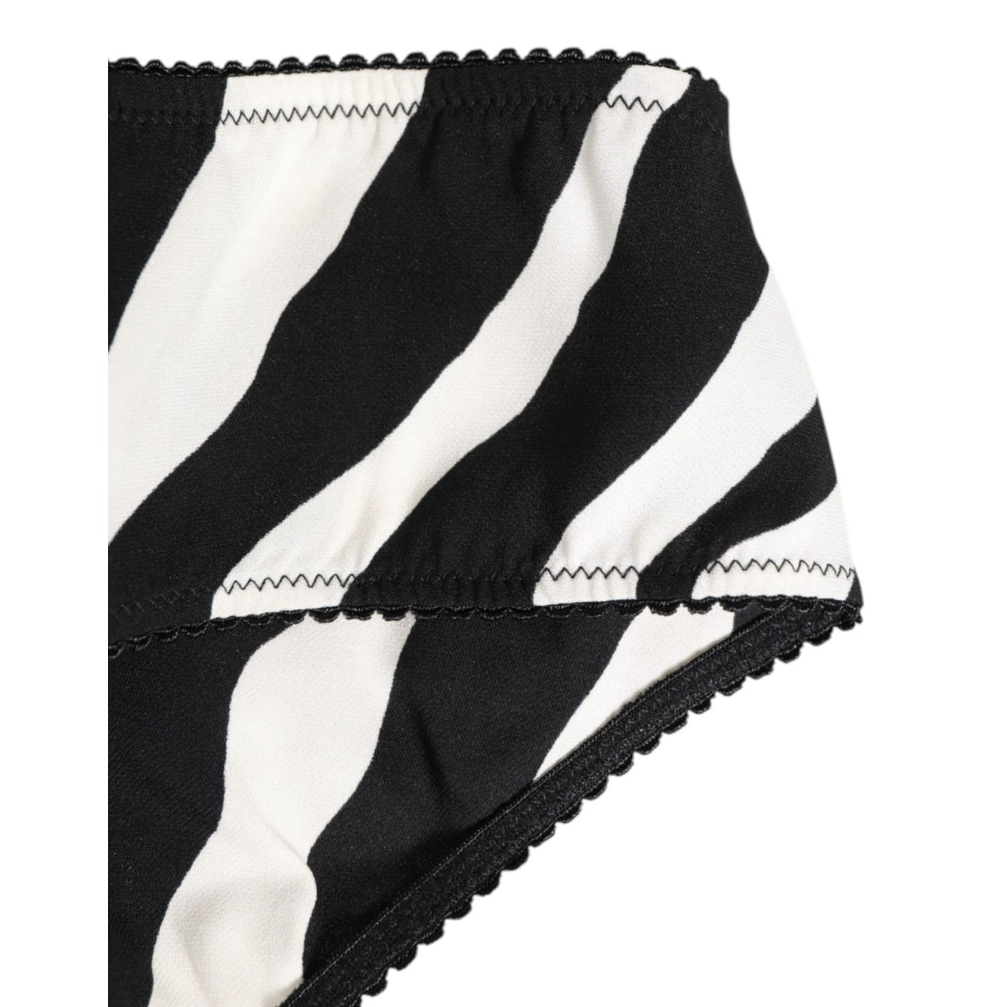 Close-up of Dolce & Gabbana Black White Zebra Print Slip Briefs Underwear with elegant detailing, made from silk and elastane.