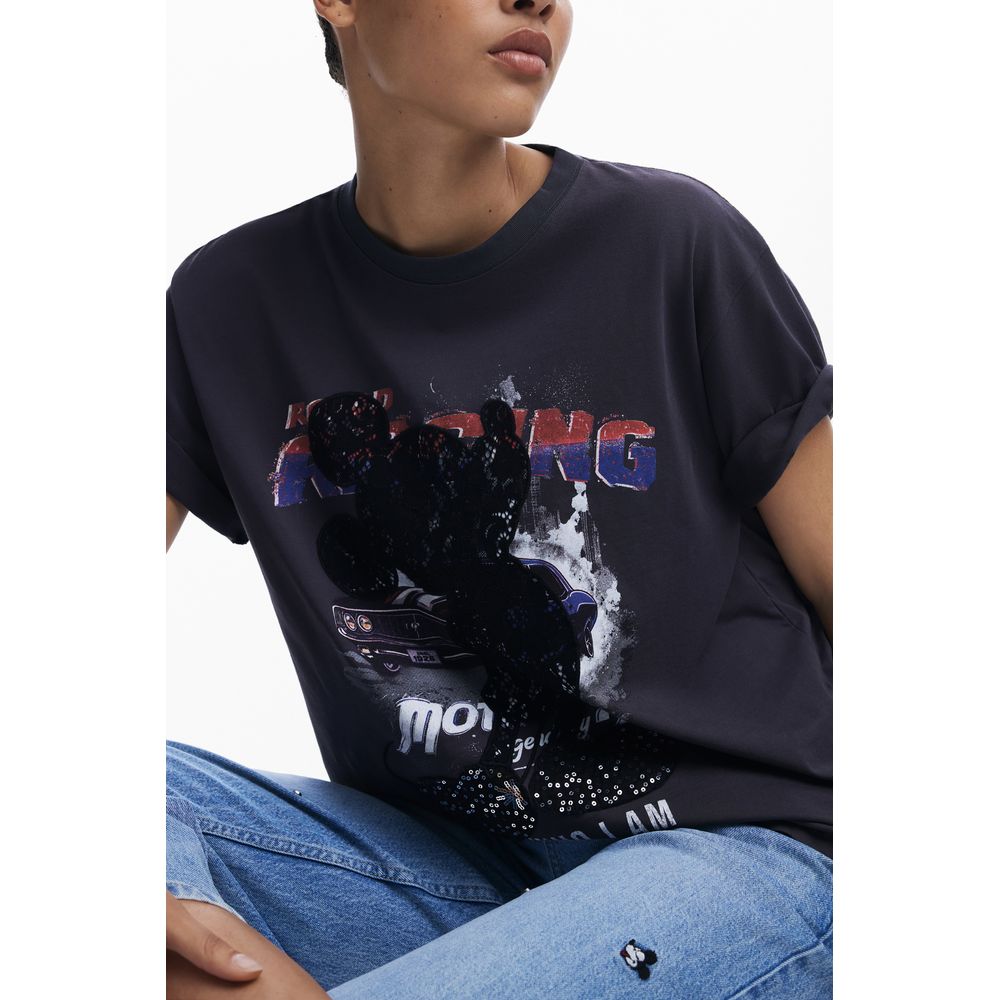 Woman wearing Desigual Black Cotton Women T-Shirt with Mickey Mouse print and sequin embellishments, showcasing trendy casual style.