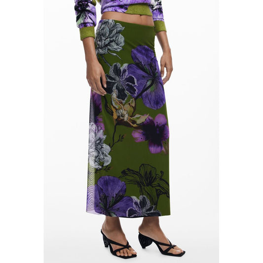 Woman wearing a Desigual Green Polyester Women Skirt with purple floral design and elasticated waist, showcasing whimsical tulle flowers.