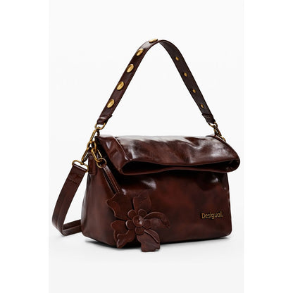 Desigual Brown Polyethylene Women Handbag with floral design and adjustable strap, featuring a stylish and practical zip pocket.