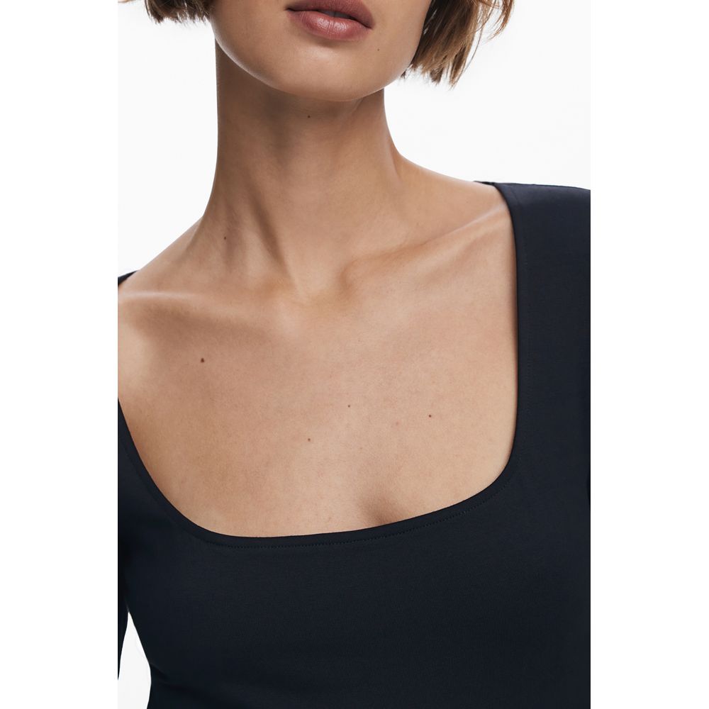 Close-up of Desigual Black Cotton Women Dress showing wide neckline, highlighting its elegant style and comfortable fit.