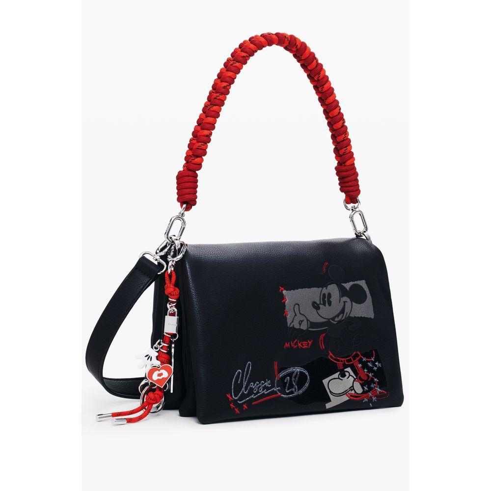 Front view with bag zipped and handles upright.
