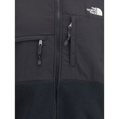 The North Face Black Polyamide Shell Jacket with zipper closure and logo detail, featuring front pockets and high collar for comfort and style.