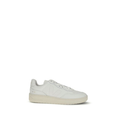 Veja White Leather Low Top Sneakers with round toe and V logo patch on side, perfect for a minimalist and sophisticated style.