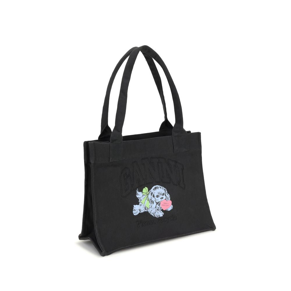 Ganni Black Cotton Shoulder Bag with puppy graphics and embroidered logo, featuring top handles and spacious compartment for essentials.