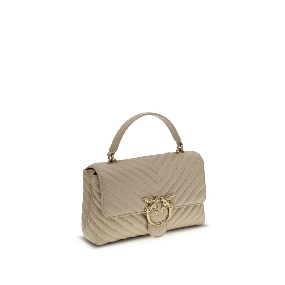 Front view with bag zipped and handles upright.