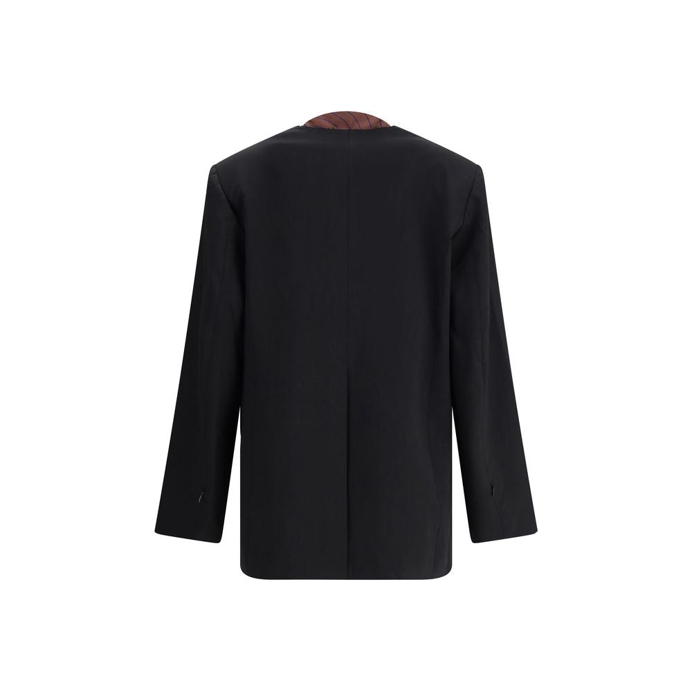 Back view of Di Stavnitser Black Polyester Blazer with raw-cut peaked lapels and welt pockets for a refined style.