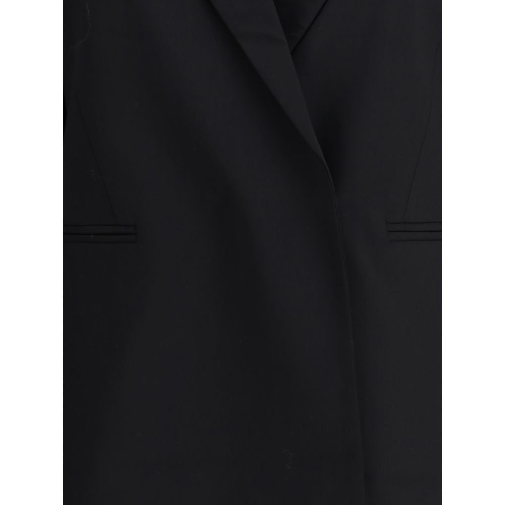Di Stavnitser Black Polyester Blazer with raw-cut peaked lapels and concealed button closure, featuring a refined, tailored design.