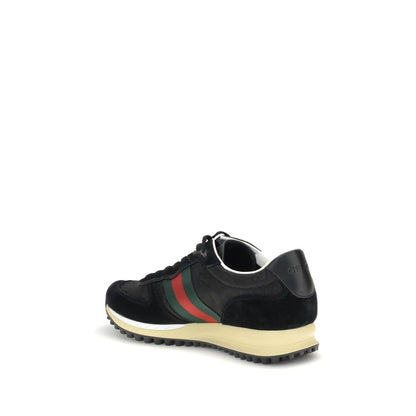 Gucci Black Polyamide Athletic Sneakers with green-red Web stripe and GG logo detail on the sole, showcasing luxury design.